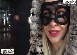 Arching her back prior to taking dog dick here