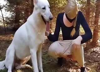 Blonde worships animal penis and cums as well