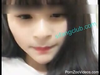 Asian cutie plays with her furry animal in homemade zoophilia.mp4
