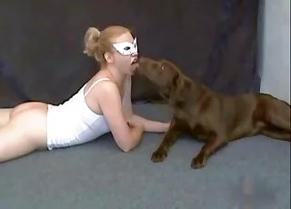 Masked Zoophile Hugs Brown Dog in Sweet Zoo Clip